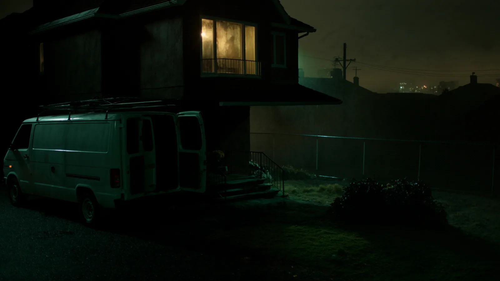 A tradesman's van outside a dark home at 2am, one window lit